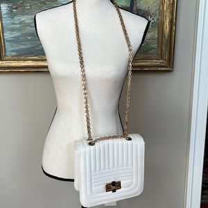 Creamy White faux leather quilted purse.